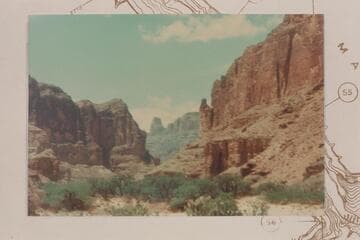 Up Kwagunt Canyon from mid-river. Hutton Butte in distance