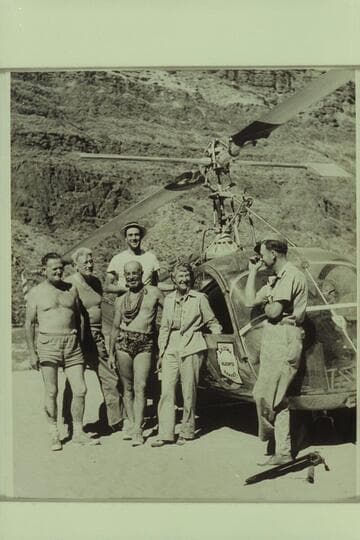 Boat party and helicopter visitors just before the plane left for the Rim from Tapeats Creek. Left to right: Taylor, Desloge, Forcier, Marston, Margaret Marston, and pilot "Red" Carson