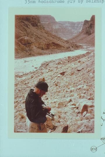 Dock pulls out register left in bottle at the Kolb inscription. Rapid No. 23 in background. Mile 202.25