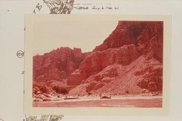 Down from the river at the mouth of Wide Valley at Mile 205.35. The mouth of Range Canyon is at left