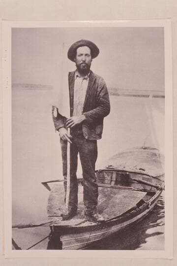 Charles Russell standing on the "Utah." Needles