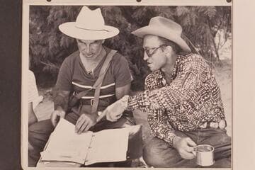 Marston (left) gets the information from Lorin Bell. Paria Riffle