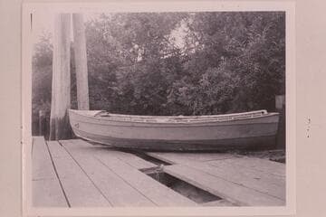 Holmstrom's boat "Julius", photographed at Coquille. Mrs. Holmstrom sold the boat to a local fisherman who cut off the stern for use with an outboard motor