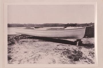One of Eddy's large boats which became either the "Powell" or the "Coronado," photographed after her arrival at Greenriver, Utah. The design was Eddy's attempt to follow the boats of the second Powell party
