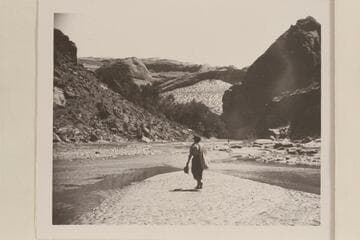 On the way back from Gregory Bridge. Canyon of the Escalante. Millie Baker carries the sack. #67 was at Rainbow Bridge
