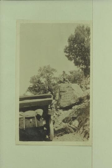 The Zahn party and their Franklin car at a lunch stop in Marsh Pass where they painted the sign on the rock. The car was taken to the San Juan River at the Zahn Mine
