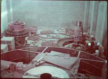Big Creek #4 project: Construction shot inside Powerhouse #4. Workers are assembling one of the vertical axis, Francis turbine-