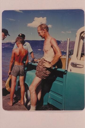 Jack Speirs at Boulder City beach; end of Grand Canyon run. Jimmy Jordan blocks out his dad and Ed I'Anson is at left