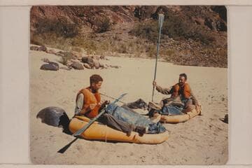 Neal Newby and Frank Moltzen at Bright Angel Creek after having left Lees Ferry Aug. 16. They are demonstrating their equipment and method of travel