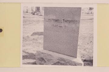 Face of triangular Thompson tombstone in Arlington Cemetery dedicated to Ellen Powell Thompson. The legend reads: 1849-1911/She hath done what she could