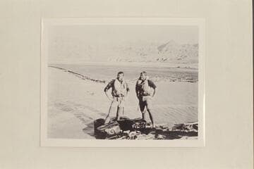 Bill Beer and John Daggett at the end of their traverse of the Grand Canyon. Grapevine Wash. The rubber bags held gear and food and provided flotation