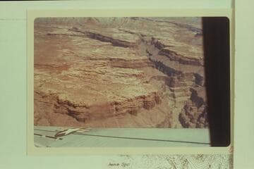Fern Glen Canyon which enters the Colorado at Mile 168. The north end of The Dome is at upper right margin