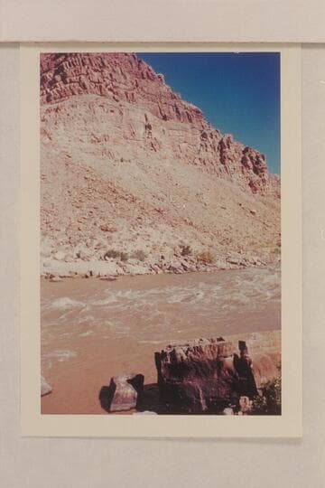 Across Rapid No. 1 in Cataract Canyon. Across to right bank and slightly upstream. Approx. gauge: 25,000 cfs