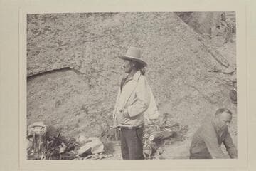 Buck Whitehat in camp. Bill Belknap at right. Middle fork of 73.6