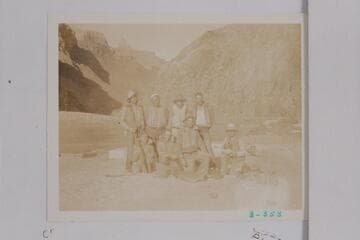The Dusty Dozen at the mouth of Pipe or Garden Creek. Fred C. Jayne was leaving the party here and is kneeling at lower right holding his cine