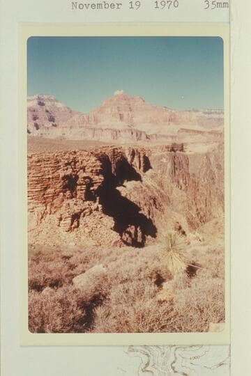 Tapeats wall on west side of Horn Creek Canyon. Old trail to the river at foot of Tapeats. Shiva and Isis in distance