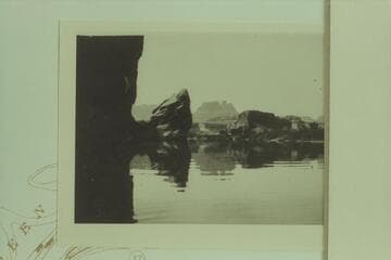 The Tooth. A block of The White Rim dropped into Green River opposite Townsite or Anderson Bottom and marking the beginning of Stillwater Canyon. Mile 30
