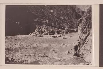 Bedrock Rapid. One of the boats in near the rock