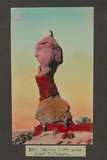 Zahn trip to San Juan placers in a Franklin car. Kit Carson Rock near Fort Defiance